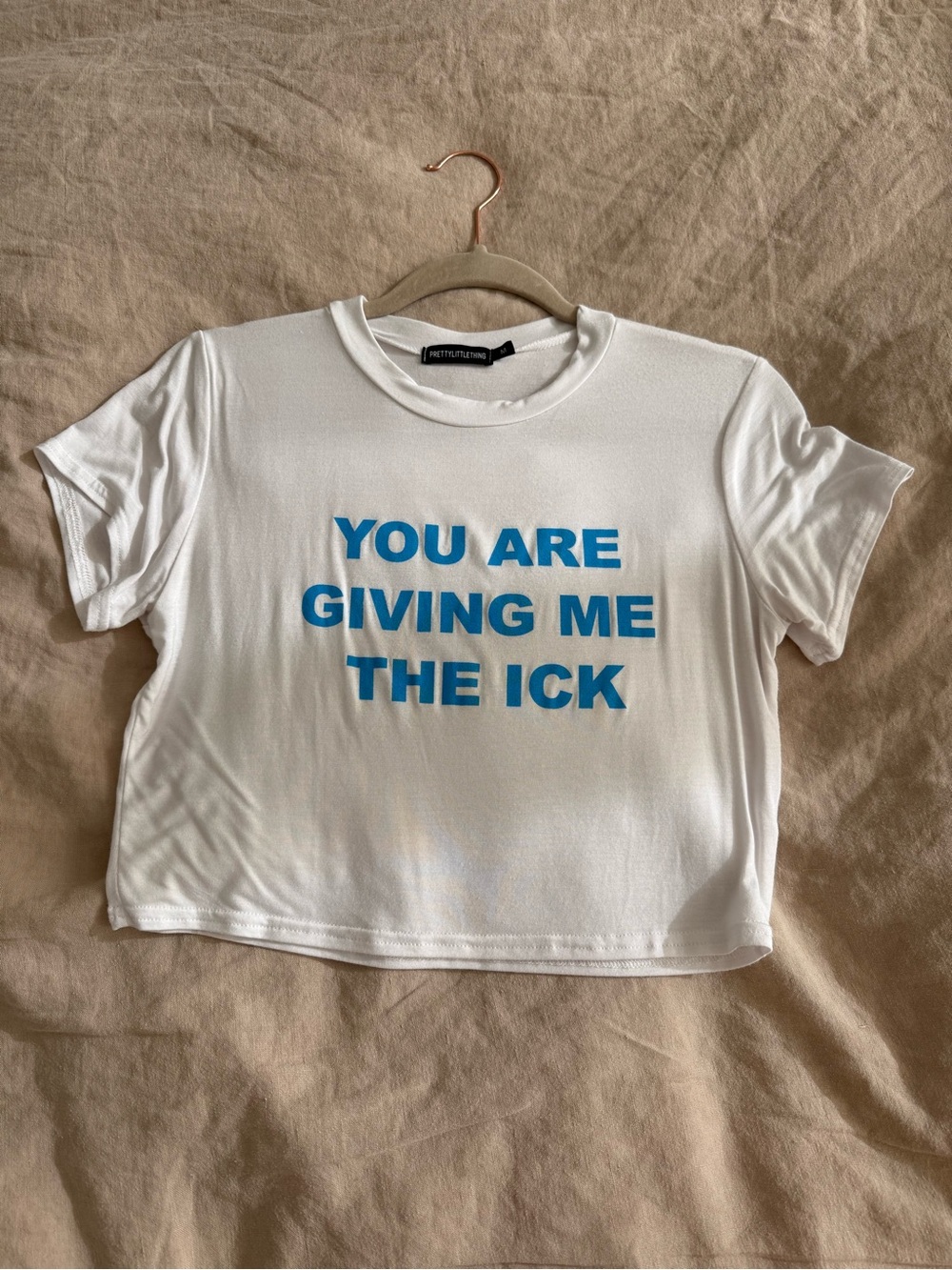 PrettyLittleThing White Cropped Tee with Blue Slogan